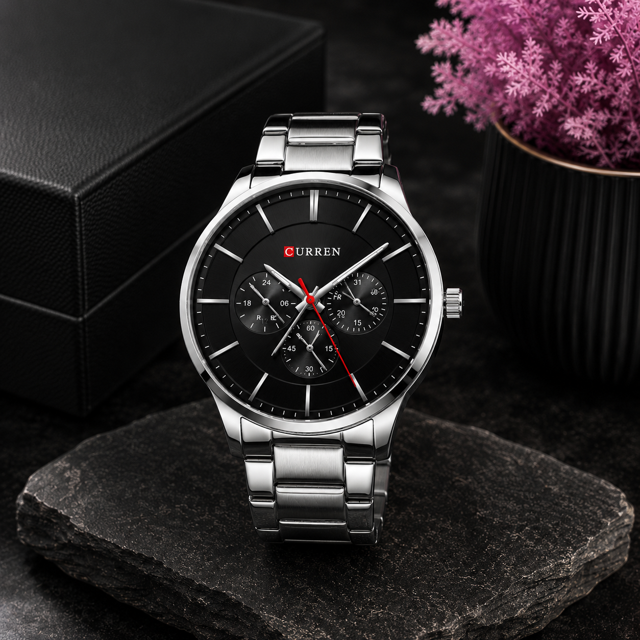 Black dial stainless steel Curren men's watch with multifunction subdials, silver bracelet, and elegant minimalist design by GotikTik.