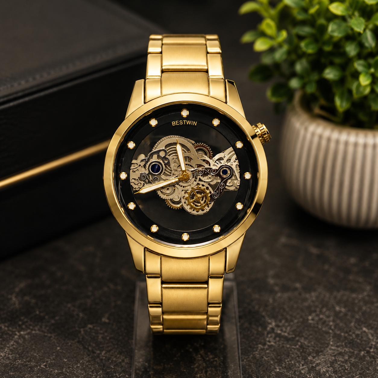 Gold stainless steel skeleton men's watch with transparent mechanical dial, automatic movement design, and luxury finish