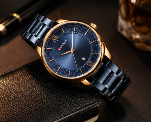 Curren analog watch with a blue dial, rose gold case, black stainless steel bracelet, and date display.
