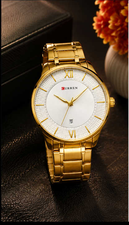 Gold stainless steel Curren men's watch with white textured dial, date display, and elegant luxury design