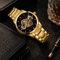 Gold stainless steel skeleton men's watch with transparent mechanical dial, automatic movement design, and luxury finish